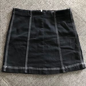 BLACK SKIRT WITH WHITE STITCHING